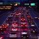 Brakelights come on as vehicles head east out of Los Angeles on the Interstate 10 freeway in Alhambra, California on May 27, 2021, ahead of the Memorial Day weekend.